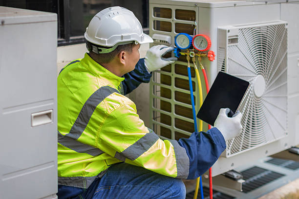 Professional Heat Pump Repair technician working in Maysville, OK